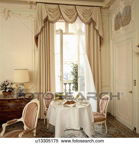 Stock Photography - curtain, interior, cloth, settings, peach, soft-furnishings, diningroom. Fotosearch