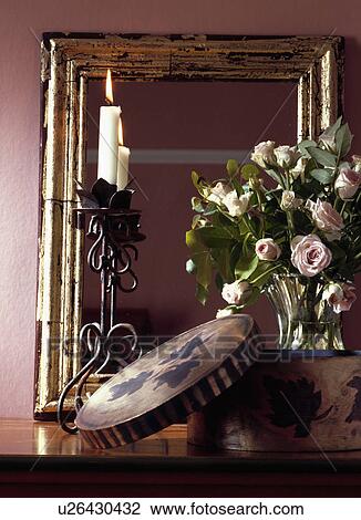 Detail, golden picture frame with black candle stick holder, flowers and decorative box View Large Photo Image Stock Image - Detail, golden picture frame with black candle stick holder, flowers and decorative box. Fotosearch