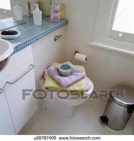 Stock Photo - Detail of toilet in small bathroom. Fotosearch