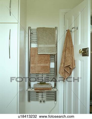 Detail of towel rail in white bathroom View Large Photo Image Stock Image - Detail of towel rail in white bathroom. Fotosearch