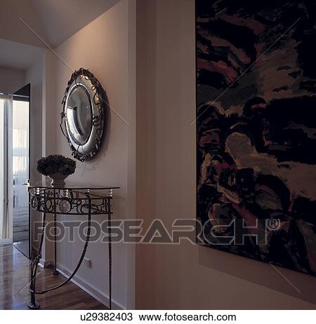 Detail of white hall with mirror and console table View Large Photo Image Stock Image - Detail of white hall with mirror and console table. Fotosearch