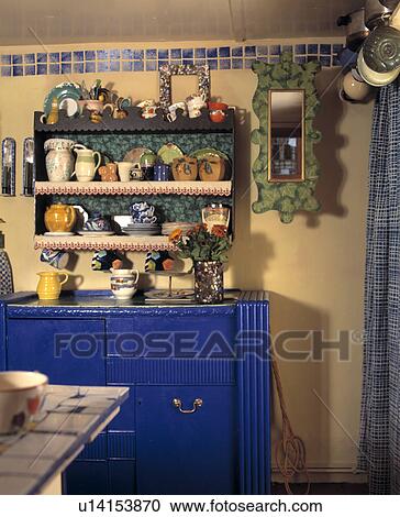 Stock Image - detail, shelving, traditional, cottage, kitchen, interior, blue. Fotosearch