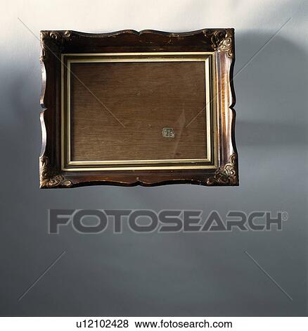 Detail shot of traditional brown wooden picture frame View Large Photo Image Stock Photo - Detail shot of traditional brown wooden picture frame . Fotosearch
