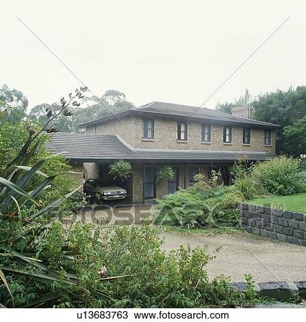 Drive in front of newbuild country house View Large Photo Image Stock Image - Drive in front of newbuild country house. Fotosearch