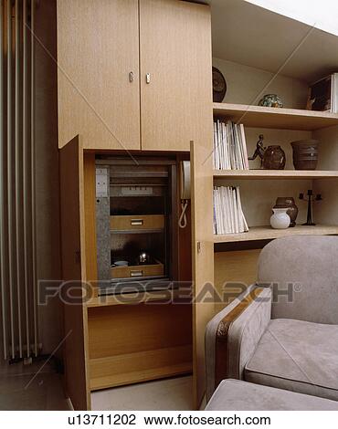 Stock Image - Dumb-waiter in living room. Fotosearch