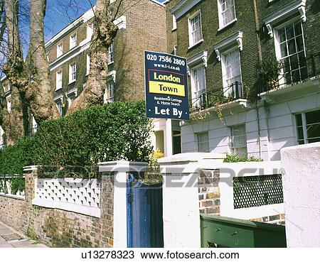 Estate Agents "For Sale" signboard in front of Victorian terraced house in North London View Large Photo Image Stock Image - Estate Agents "For Sale" signboard in front of Victorian terraced house in North London. Fotosearch