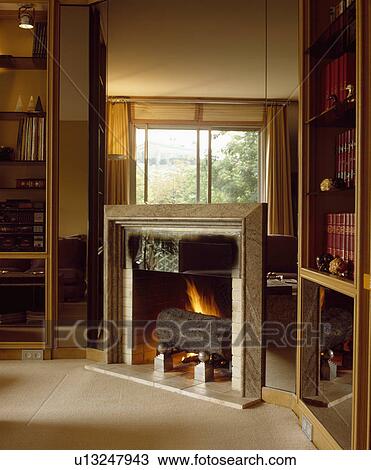 Stock Image - Fireplace in modern living room. Fotosearch