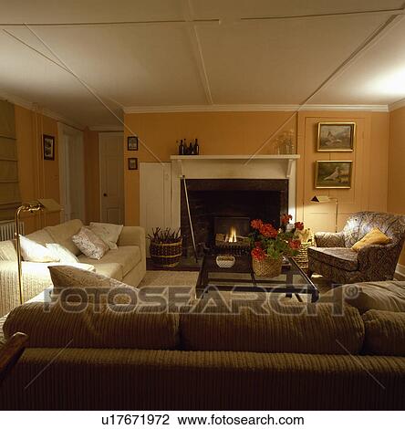 Fireplace in traditional country living room View Large Photo Image Stock Image - Fireplace in traditional country living room. Fotosearch