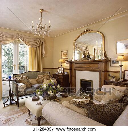 Fireplace in traditional country living room View Large Photo Image Stock Photo - Fireplace in traditional country living room. Fotosearch