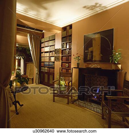 Stock Image - fireplace, interior, terracotta, carpet, sisal, town, interiors. Fotosearch