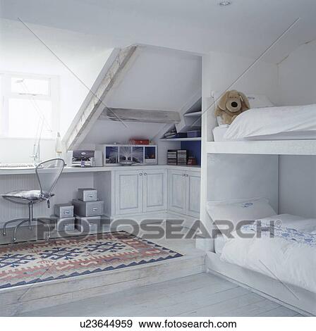 Fitted White Bunk Beds In Children S Attic Bedroom With