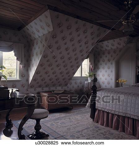 Floral wallpaper in attic bedroom with wooden ceiling and pastel patterned rug View Large Photo Image Stock Photography - Floral wallpaper in attic bedroom with wooden ceiling and pastel patterned rug. Fotosearch