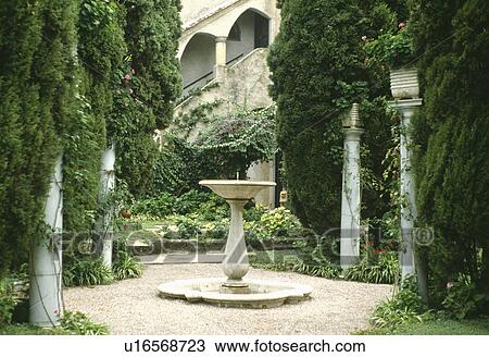 Formal fountain in Mediterranean garden View Large Photo Image Stock Image - Formal fountain in Mediterranean garden. Fotosearch