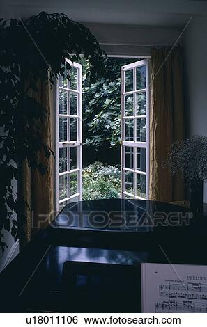 French doors in traditional town living room View Large Photo Image Stock Photograph - French doors in traditional town living room. Fotosearch
