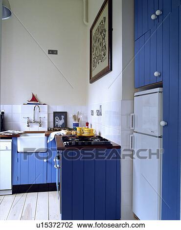 Stock Image - fridges, interior, traditional, kitchens, interiors, blue. Fotosearch
