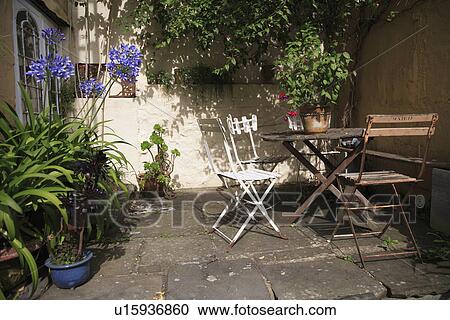 furniture, courtyard, containers, gardens View Large Photo Image Stock Image - furniture, courtyard, containers, gardens. Fotosearch