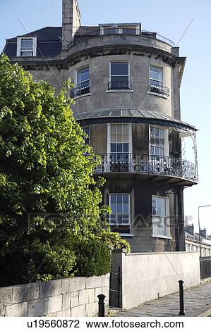 Stock Image - Georgian townhouse with curved wall and balcony. Fotosearch