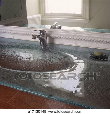 Stock Photo - glass, interior, modern, earth colours, neutrals, taps. Fotosearch