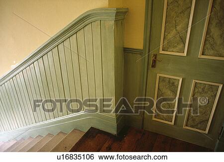 Green Door With Paint Effect Marbled Panels On Landing Above