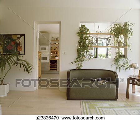 Green sofa in modern white living room View Large Photo Image Stock Image - Green sofa in modern white living room. Fotosearch