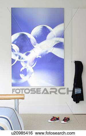 Large blue+white abstract picture on wall of child's modern bedroom with sneakers on floor View Large Photo Image Stock Photograph - Large blue+white abstract picture on wall of child's modern bedroom with sneakers on floor. Fotosearch