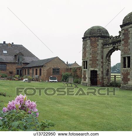 Large Elizabethan gateway beside barn conversion View Large Photo Image Stock Image - Large Elizabethan gateway beside barn conversion. Fotosearch