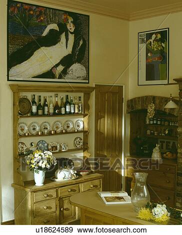 Large picture above pine dresser in country kitchen View Large Photo Image Stock Photo - Large picture above pine dresser in country kitchen. Fotosearch