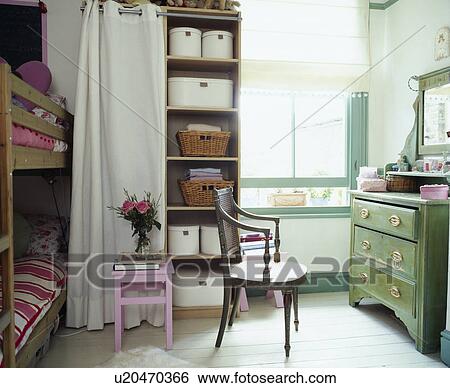 Large traditional green and white children's bedroom with bunk-beds, painted floorboards and green chest with mirror View Large Photo Image Stock Photograph - Large traditional green and white children's bedroom with bunk-beds, painted floorboards and green chest with mirror. Fotosearch
