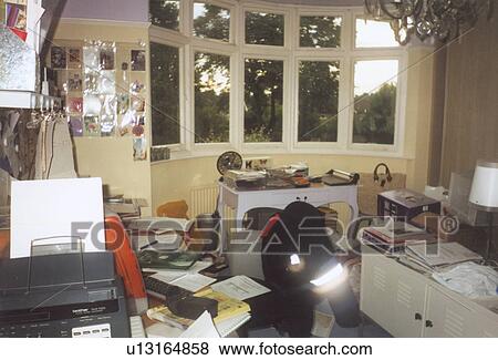 Stock Photo - Large white bedroom used as a home office . Fotosearch