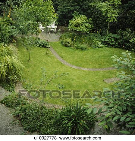 Lawn in summer country garden View Large Photo Image Stock Photo - Lawn in summer country garden. Fotosearch