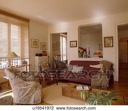 Loosecover on armchair nad sofa in traditional living room View Large Photo Image Stock Image - Loosecover on armchair nad sofa in traditional living room. Fotosearch