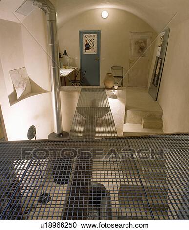 Metal mesh walkway across openplan eighties study and hall View Large Photo Image Stock Image - Metal mesh walkway across openplan eighties study and hall. Fotosearch