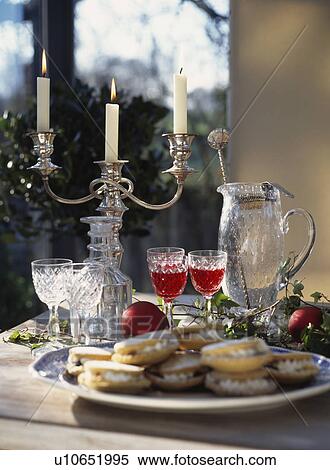 Mincepies with red wine lit by silver candle stick. View Large Photo Image Stock Photography - Mincepies with red wine lit by silver candle stick.. Fotosearch