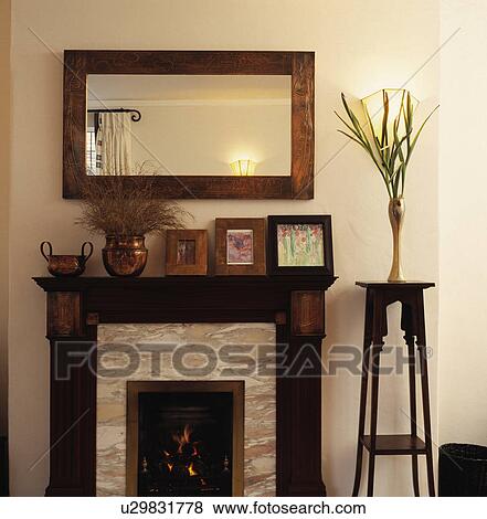 Mirror above fireplace View Large Photo Image Stock Photo - Mirror above fireplace. Fotosearch