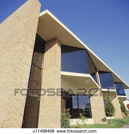 Stock Photo - Modern architectural brick town house. Fotosearch