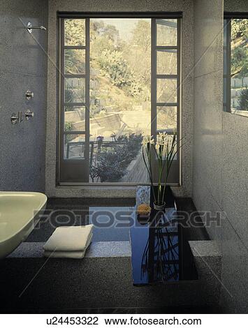 Modern grey bathroom with shower in front of large window View Large Photo Image Stock Image - Modern grey bathroom with shower in front of large window. Fotosearch