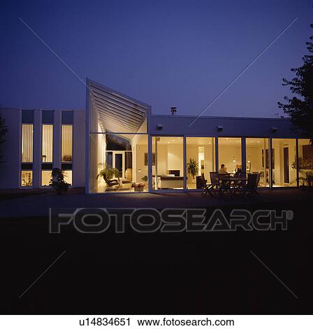 Modern house in the country lit at night View Large Photo Image Stock Image - Modern house in the country lit at night. Fotosearch