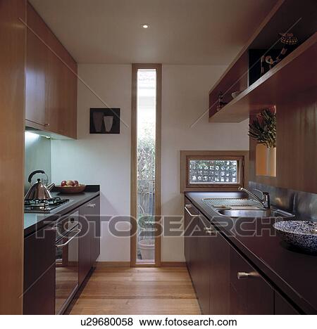 Modern Narrow Kitchen. View Large Photo Image Stock Photo - Modern Narrow Kitchen.. Fotosearch