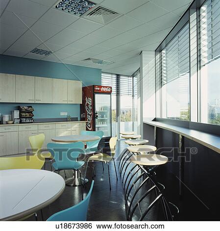Modern staff restaurant with tables and bar stools overlooking the park. View Large Photo Image Stock Photograph - Modern staff restaurant with tables and bar stools overlooking the park.. Fotosearch