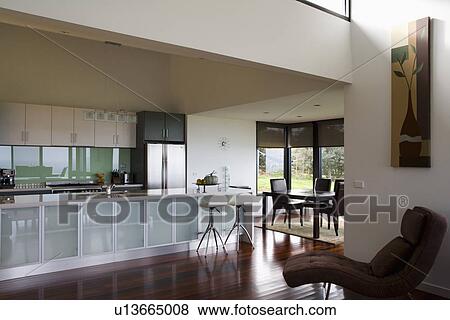 Modern streamlined kitchen and dining area, Australia View Large Photo Image Stock Photo - Modern streamlined kitchen and dining area, Australia. Fotosearch