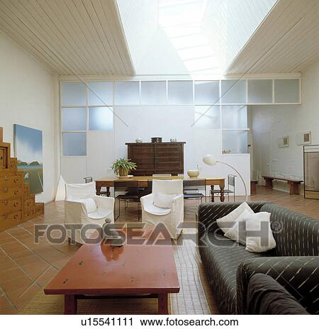 Modern white living room with red table and grey sofa View Large Photo Image Stock Image - Modern white living room with red table and grey sofa. Fotosearch