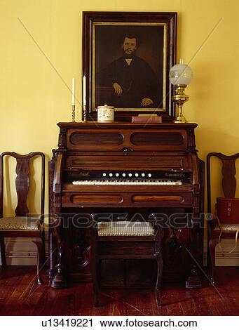 Oil portrait above old organ View Large Photo Image Stock Image - Oil portrait above old organ. Fotosearch