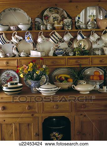 Old china and crockery on pine dresser View Large Photo Image Picture - Old china and crockery on pine dresser. Fotosearch