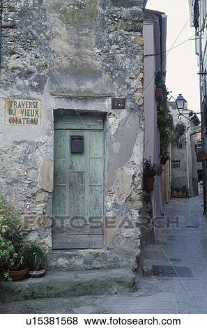 Old door in dilapidated house in French village View Large Photo Image Stock Photo - Old door in dilapidated house in French village. Fotosearch
