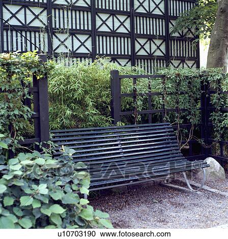 Old Victorian bench in front of timbered house View Large Photo Image Stock Image - Old Victorian bench in front of timbered house. Fotosearch