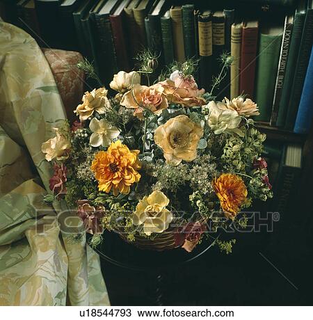 Orange and yellow roses with orange dahlias in formal fresh flower arrangement View Large Photo Image Stock Image - Orange and yellow roses with orange dahlias in formal fresh flower arrangement. Fotosearch