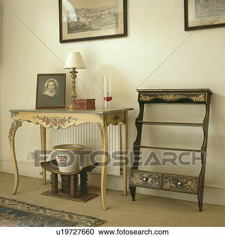 Painted console table and antique shelf View Large Photo Image Stock Image - Painted console table and antique shelf. Fotosearch