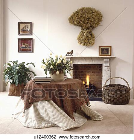 Paisley cloth over cream cloth on circular table in cream living room View Large Photo Image Stock Image - Paisley cloth over cream cloth on circular table in cream living room. Fotosearch