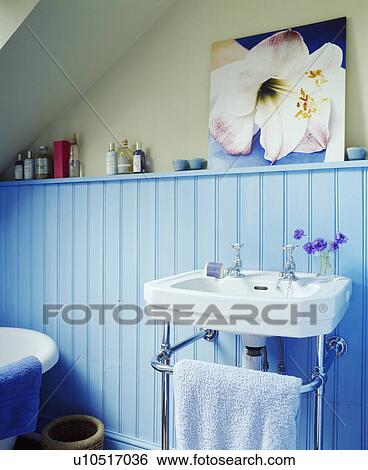Pale blue attic bathroom with velux style window View Large Photo Image Stock Photograph - Pale blue attic bathroom with velux style window. Fotosearch
