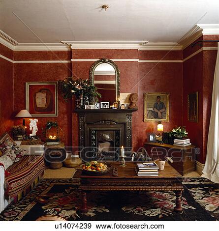 Stock Photo - Patterned red wallpaper in traditional living room. Fotosearch